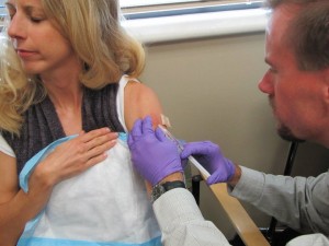 Removing the bot fly from under the skin