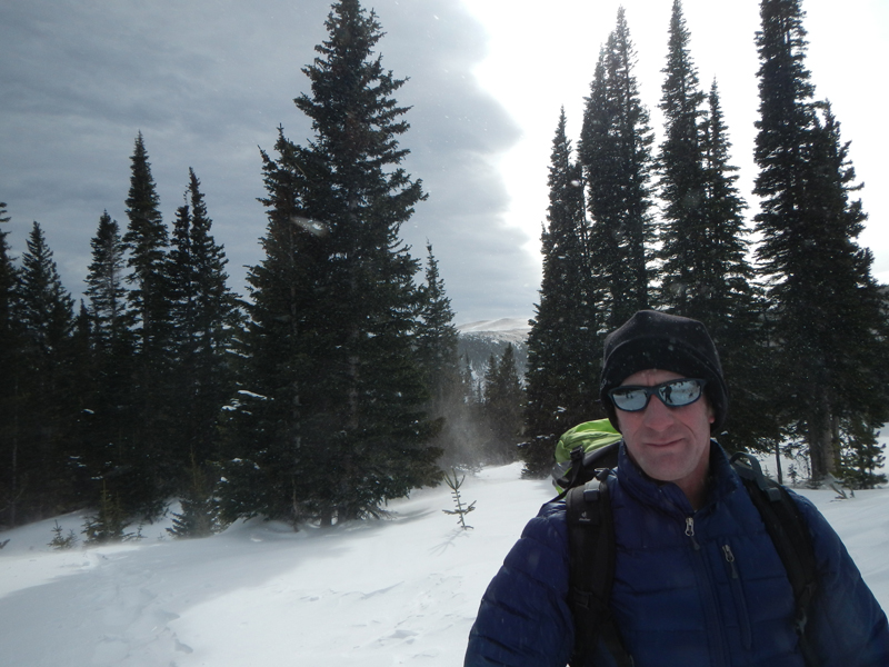 Cool, stormy background with the side of Kingston Peak barely visible. 