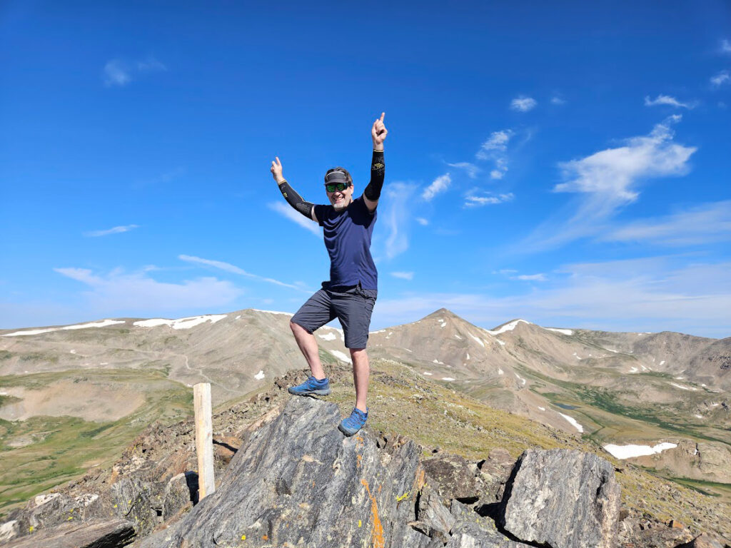 James Dziezynski on the summit of London Mountain. 